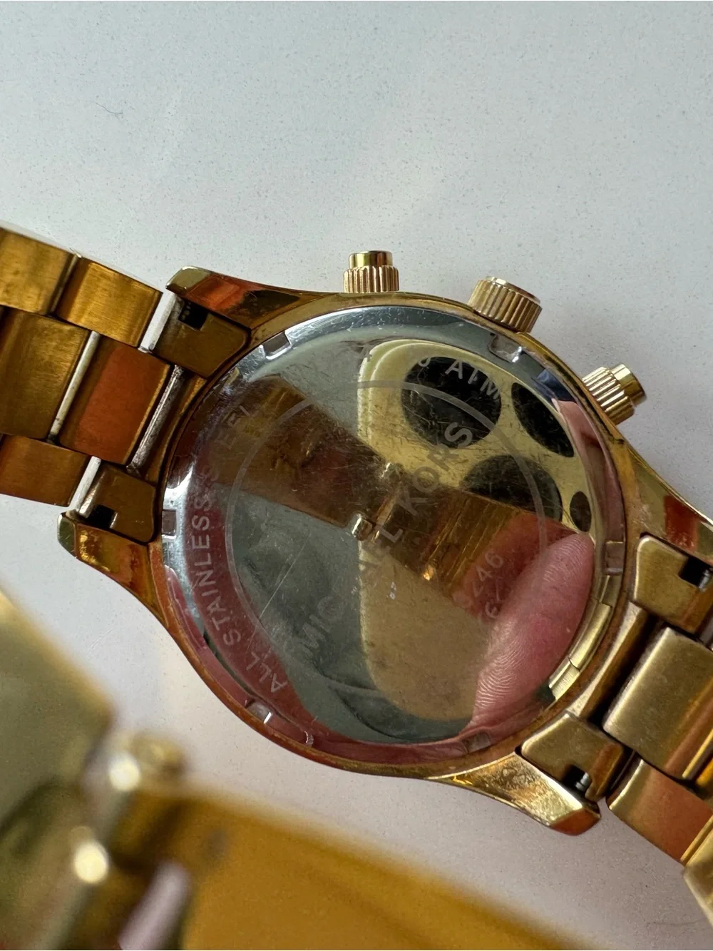 Michael Kors Gold and Black Chronograph Watch with Red Accent